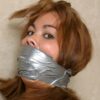 Tape wrap gagged brunette